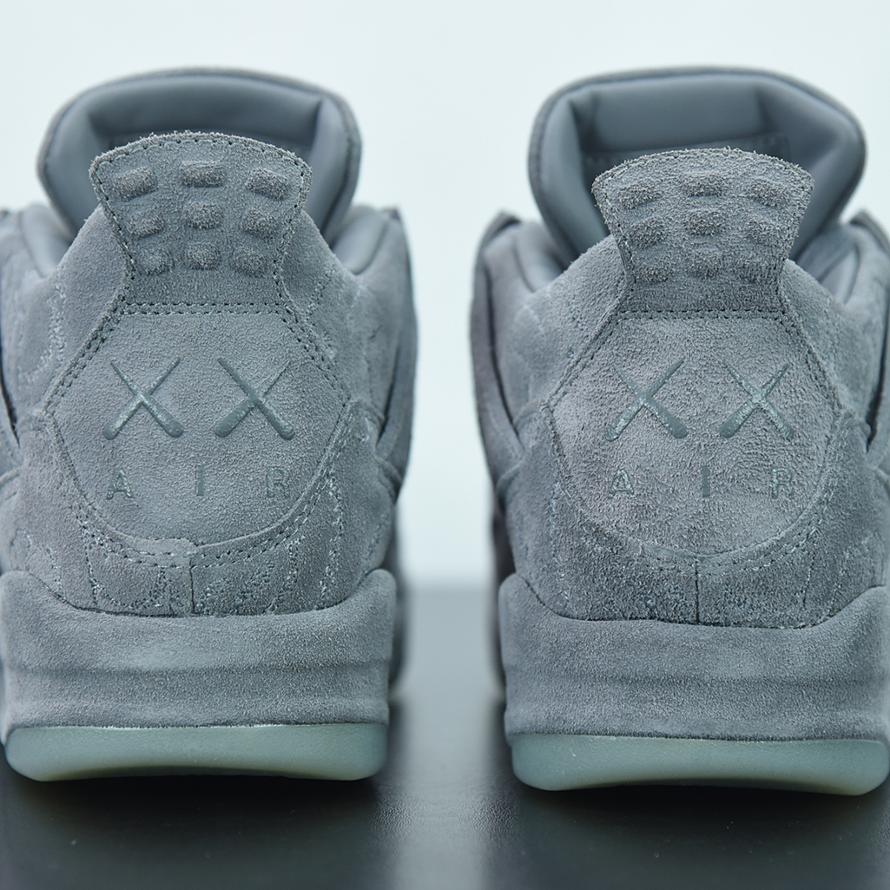 KAWS x Air Jordan 4 Retro "Cool Grey"